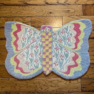 MacKenzie-Childs butterfly rug. 35” wide by 24”tall